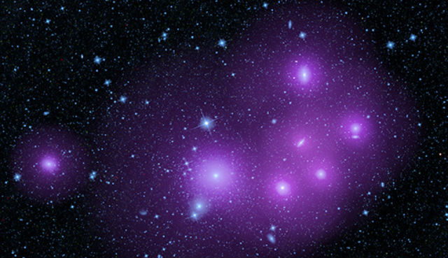 Чёрные дыры в ядрах галактик бывают яркими или "задымлёнными" (иллюстрация NASA/JPL-Caltech). 